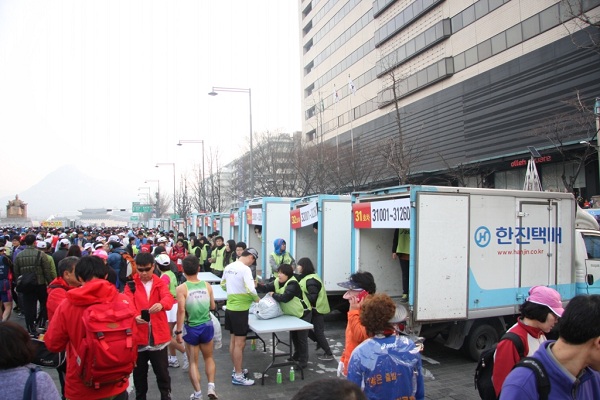 믿음의 '한진' 서울국제마라톤대회 공식물류업체 선정 기사의 사진