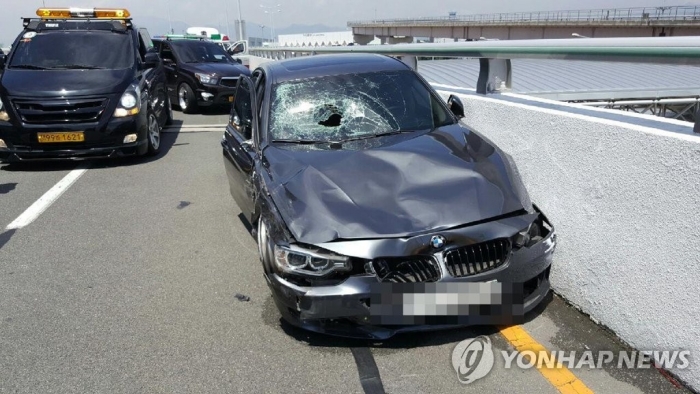 ‘김해공항 사고’ BMW 운전자, 알고보니 항공사 직원. 사진=부산지방경찰청 제공,연합뉴스