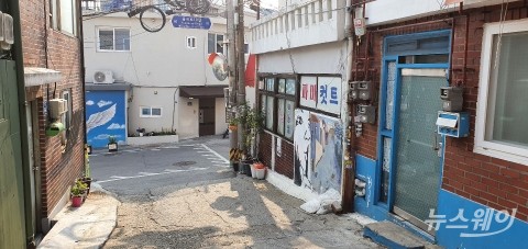 벽화마을로 성공했다는 종로구 이화동···‘재개발vs재생’ 갈등 여전