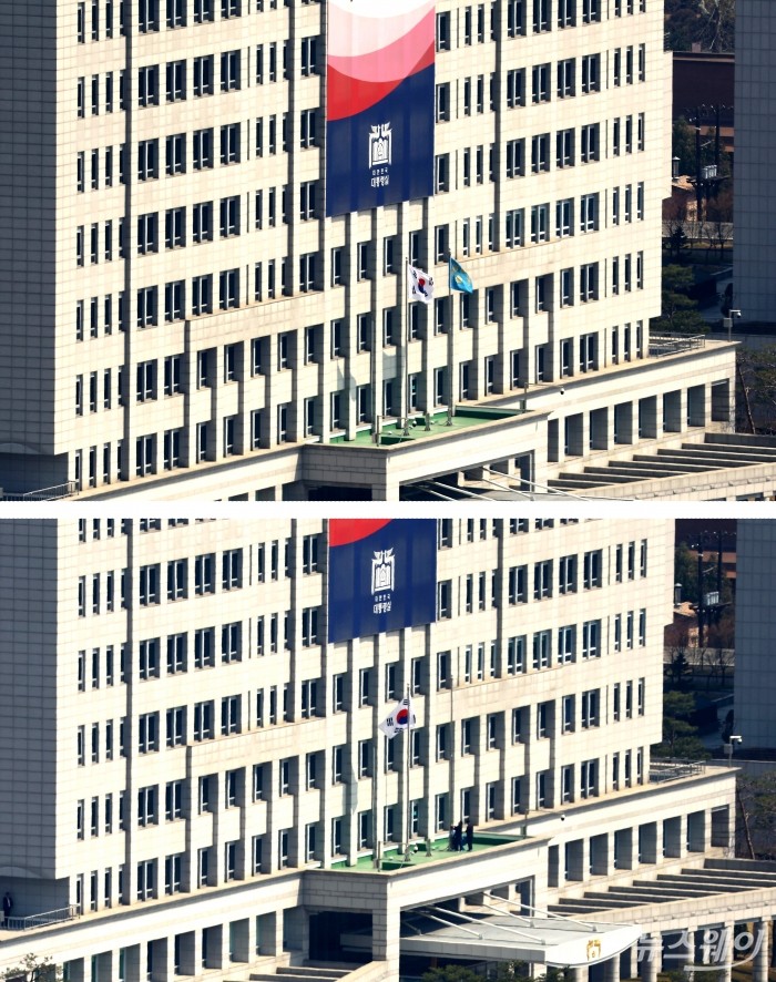 4일 헌법재판소의 윤석열 대통령에 대한 헌법재판소의 파면 선고가 내려지기 전 용산 대통령실에 봉황기가 게양돼 있다. 파면 선고 이후 대통령실 관계자들 봉황기를 내리고 있다. 사진=사진공동취재단